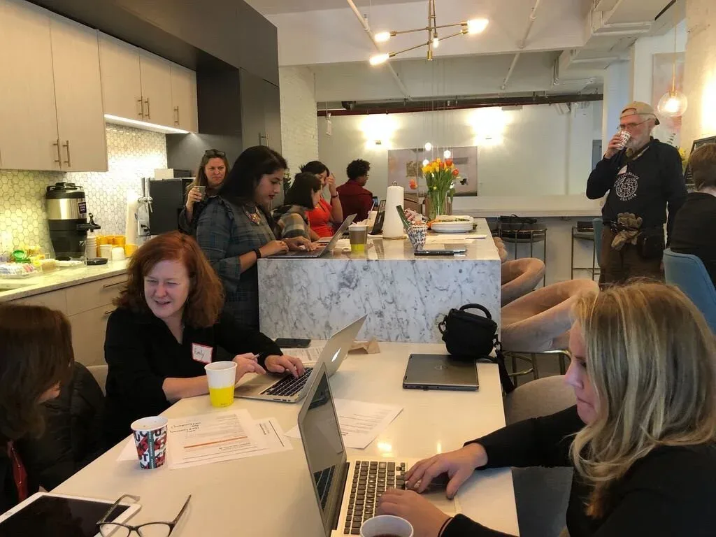 Women Do News participants working on Wikipedia articles during an edit-a-thon
